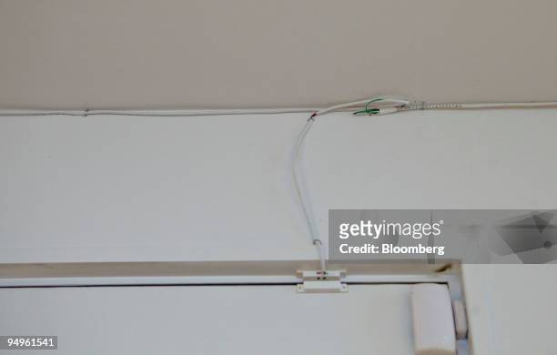 Wiring from a court-ordered home monitoring system is seen inside the apartment of Marc Dreier, founder of law firm Dreier LLP sentenced to 20 years...