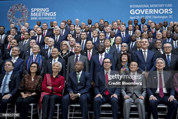 International Monetary Fund governors including Nicolas Dujovne, Argentina's treasury minister, front row from left, Sri Mulyani Indrawati,...