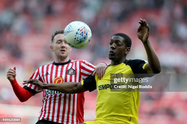 Aiden McGeady of Sunderland challenges Marvin Sordell of Burton Albion during the Sky Bet Championship match between Sunderland and Burton Albion at...