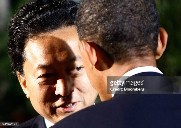 President Barack Obama, right, greets Yukio Hatoyama, prime minister of Japan, to the welcoming dinner for Group of 20 leaders on day one of the G-20...