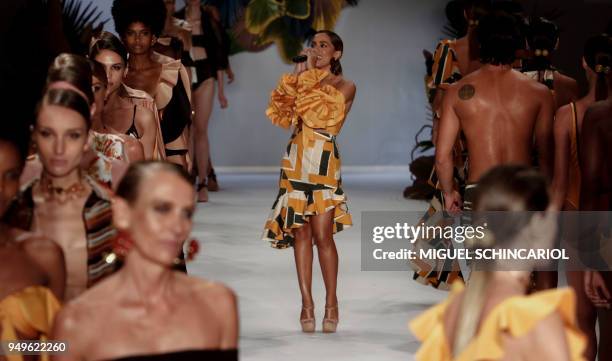 Brazilian singer Anitta performs during the presentation of Agua de Coco for Liana Thomaz in the Sao Paulo Fashion Week in Sao Paulo, Brazil on April...