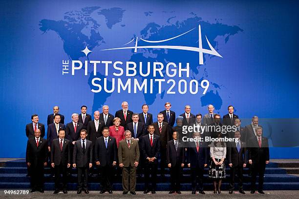 Leaders from the Group of 20 nations take part in a group photo on day two of the G-20 summit in Pittsburgh, Pennsylvania, U.S., on Friday, Sept. 25,...