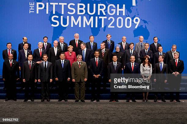 Leaders from the Group of 20 nations take part in a group photo on day two of the G-20 summit in Pittsburgh, Pennsylvania, U.S., on Friday, Sept. 25,...