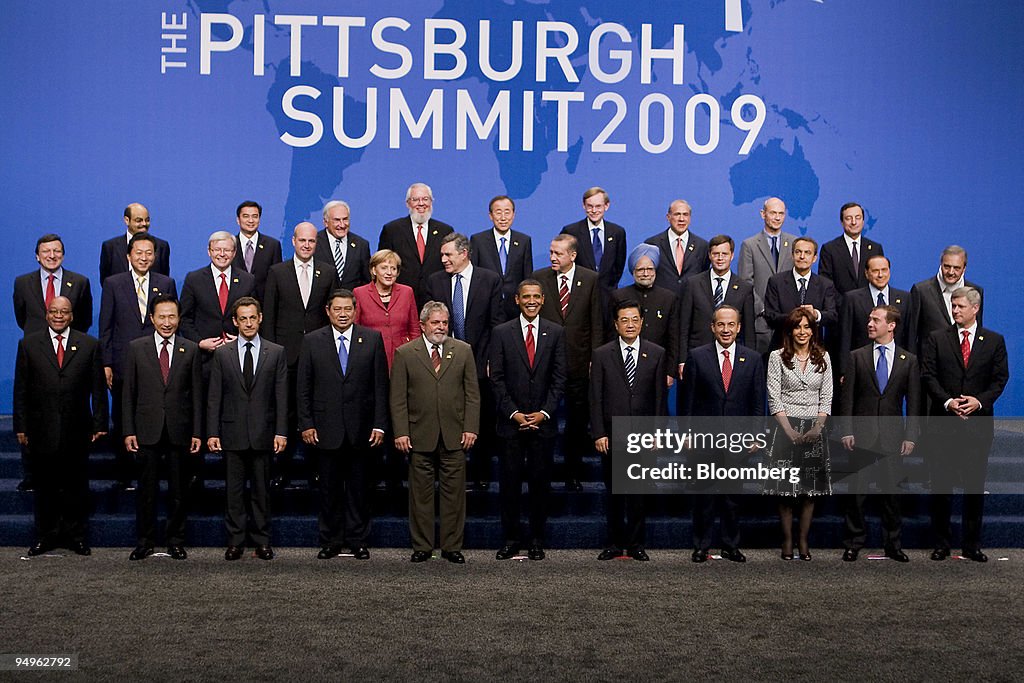 Leaders from the Group of 20 nations take part in a group ph
