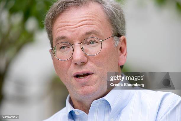 Eric Schmidt, chairman and chief executive officer of Google Inc., speaks during a television interview at the Allen & Co. Media and Technology...