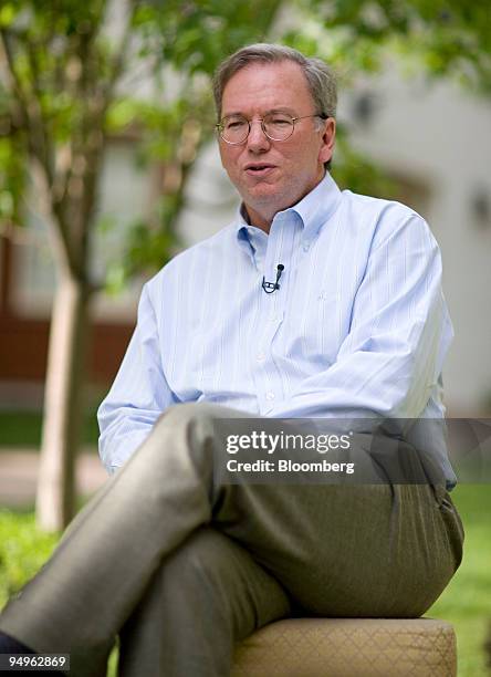 Eric Schmidt, chairman and chief executive officer of Google Inc., speaks during a television interview at the Allen & Co. Media and Technology...