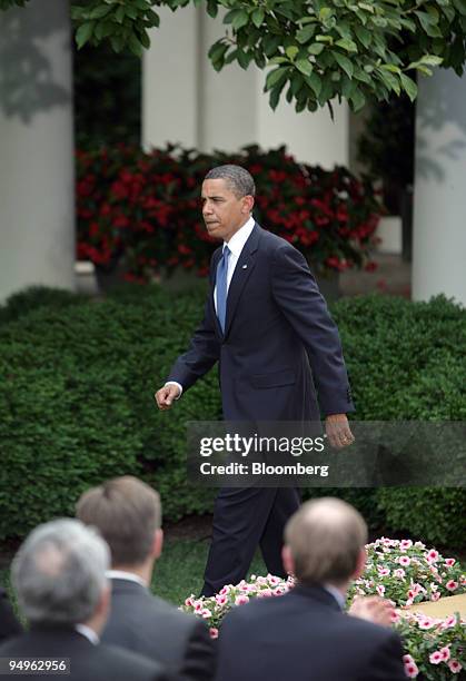 President Barack Obama departs the Rose Garden after signing the Family Smoking Prevention and Tobacco Control Act at the White House in Washington,...