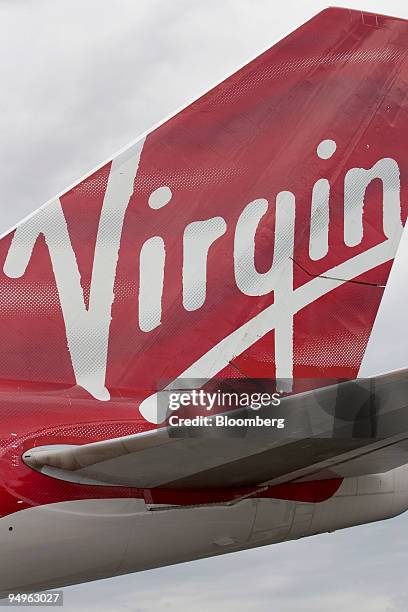 Virgin Atlantic Airways flight VS001, carrying Richard Branson, chairman of Virgin Group Ltd. To celebrate the airline's 25th anniversary by...