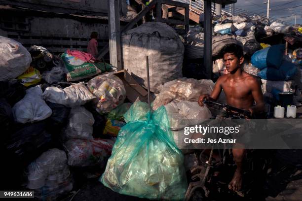 Residents of Happy Land village collects and recycle plastic wastes as a means of living on April 18, 2018 in Manila, Philippines. The Philippines...