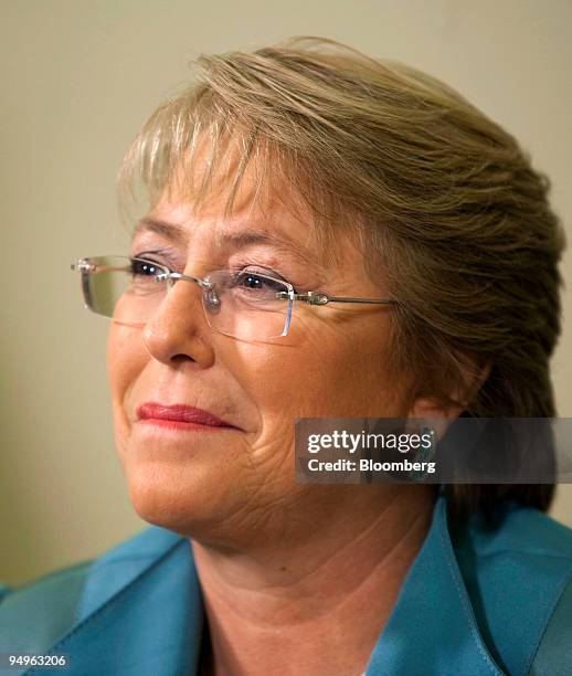 Michelle Bachelet, Chile's president, listens during a meeting with U.S. President Barack Obama, in the Oval Office at the White House in Washington,...