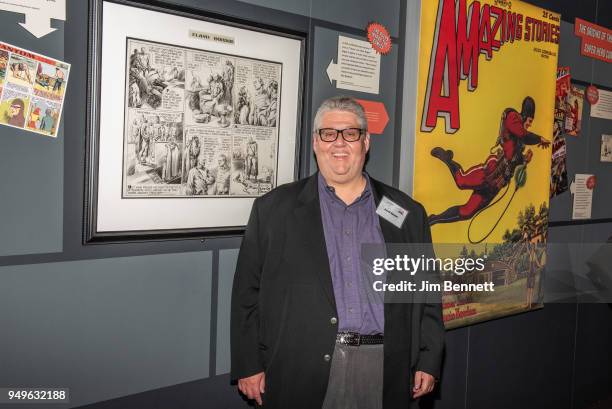 Veep executive producer and showrunner and comics collector David Mandel stands next to comic artwork from his collection that he loaned for the...