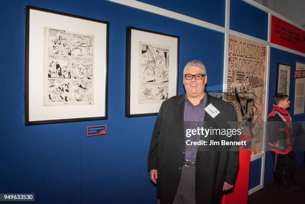 Veep executive producer and showrunner and comics collector David Mandel stands next to comic artwork from his collection that he loaned for the...