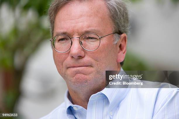 Eric Schmidt, chairman and chief executive officer of Google Inc., speaks during a television interview at the Allen & Co. Media and Technology...