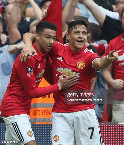 Alexis Sanchez of Manchester United celebrates scoring their first goal during the Emirates FA Cup semi-final match between Manchester United and...