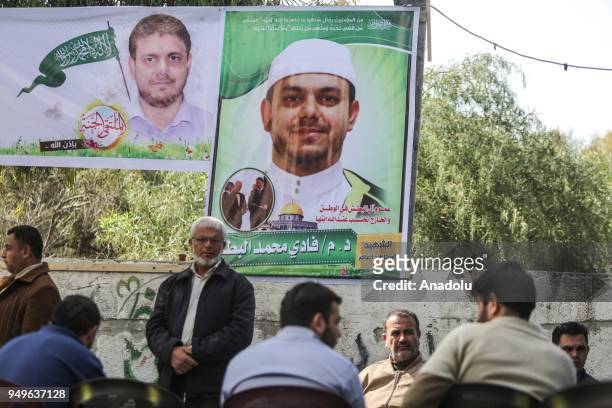 Palestinians attend a funeral ceremony of Palestinian scholar Fadi al-Batsh, who was shot dead in Kuala Lumpur, at Jabalia Refugee Camp in Gaza City,...
