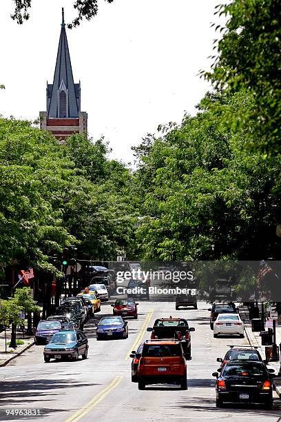 Cars make their way down Beekman Avenue in Sleepy Hollow, New York, U.S., on Thursday, June 25, 2009. General Motors Corp. Closed its minivan factory...