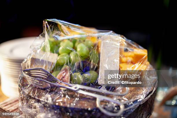 wrapped tray of fruits and cheese - prosciutto wrapped stock pictures, royalty-free photos & images