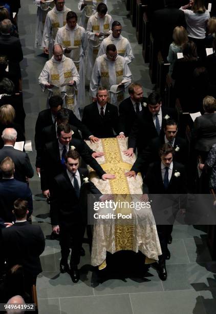 Pallbearers move casket of former first lady Barbara Bush after a funeral service at St. Martin's Episcopal Church, April 21, 2018 in Houston, Texas....