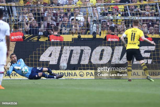 Marco Reus of Dortmund sees his penalty kick saved by goalkeeper Ramazan Oezcan of Bayer Leverkusen during the Bundesliga match between Borussia...