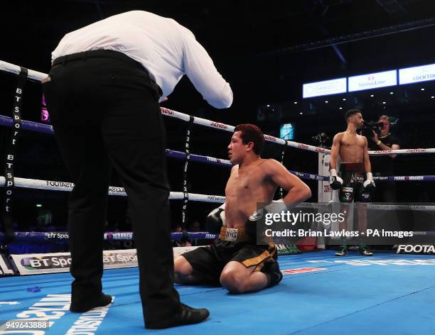 Michael Issac Carrero is counted out in the first round as Sam Maxwell looks on during their Super-Lightweight bout at the SSE Arena, Belfast.