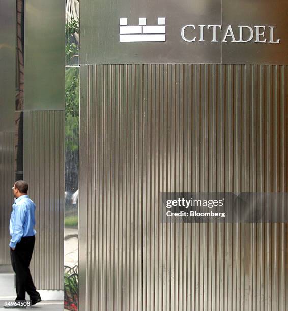 Man walks outside the offices of Citadel Investment Group LLC in Chicago, Illinois, U.S., on Friday, July 10, 2009. Citadel Investment Group LLC, the...