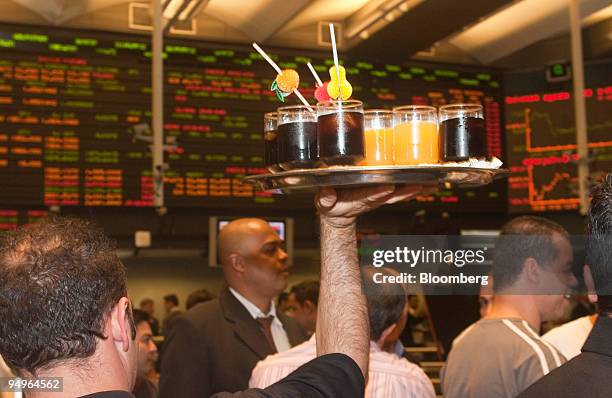 Traders celebrate the end of derivatives pit trading, at the Brazilian Bolsa de Mercadorias e Futuros, or Brazilian Mercantile and Futures Exchange ,...