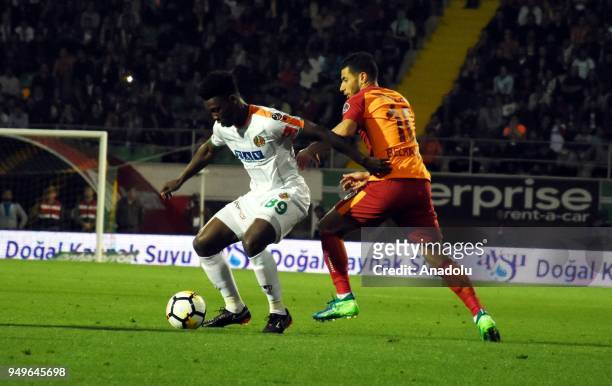 Belhanda of Galatasaray in action against Gassama of Aytemiz Alanyaspor during Turkish Super Lig soccer match between Aytemiz Alanyaspor and...
