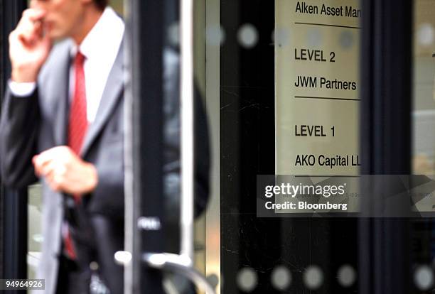 Businessman leaves the building which houses the London office of JWM Partners in London, U.K., on Wednesday, July 8, 2009. John Meriwether, who...