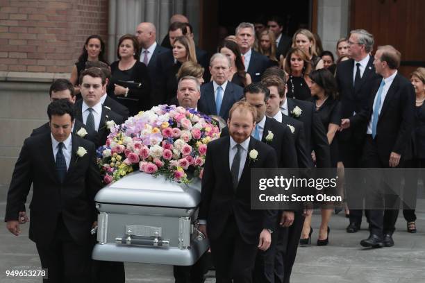 The coffin of former first lady Barbara Bush is carried from St. Martin's Episcopal Church following her funeral service on April 21, 2018 in...