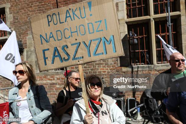 Woman with banner that says fascism is comming is seen in Gdansk, Poland on 21 April 2018 Houndreds of people gathered in front of old City Hall in...