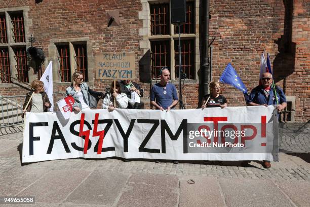 Protesters with Stop fascism slogan are seen in Gdansk, Poland on 21 April 2018 Houndreds of people gathered in front of old City Hall in Gdansk, to...