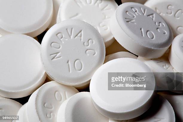 Pills of Pfizer Inc.'s blood pressure drug Norvasc are arranged for a photo at New London Pharmacy in New York, U.S., on Wednesday, July 22, 2009....