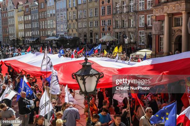 Huge Polish flag is seen in Gdansk, Poland on 21 April 2018 Houndreds of people gathered in front of old City Hall in Gdansk, to protest against...