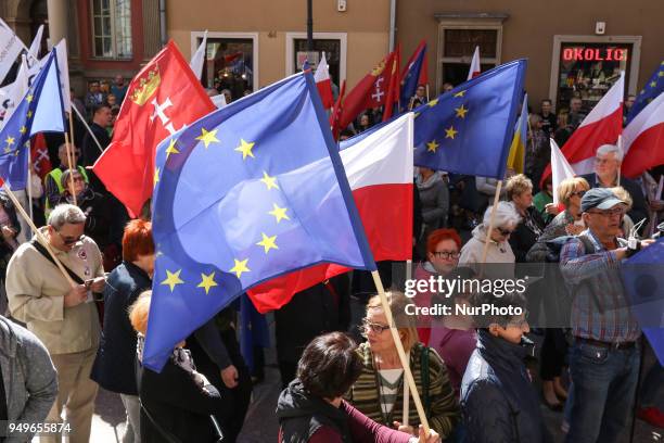 People with Polish and EU flags are seen in Gdansk, Poland on 21 April 2018 Houndreds of people gathered in front of old City Hall in Gdansk, to...