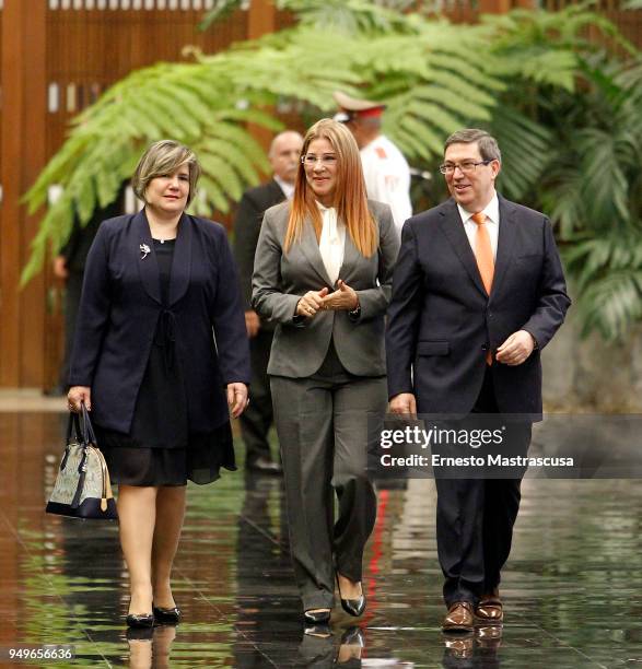 Lis Cuesta wife of the new Cuban president Miguel Diáz-Canel walks with the first lady of Venezuela Cilia Flores and the Cuban Chancellor Bruno...