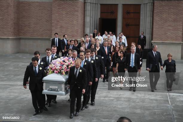 The remains of former first lady Barbara Bush are carried from St. Martin's Episcopal Church following her funeral service on April 21, 2018 in...