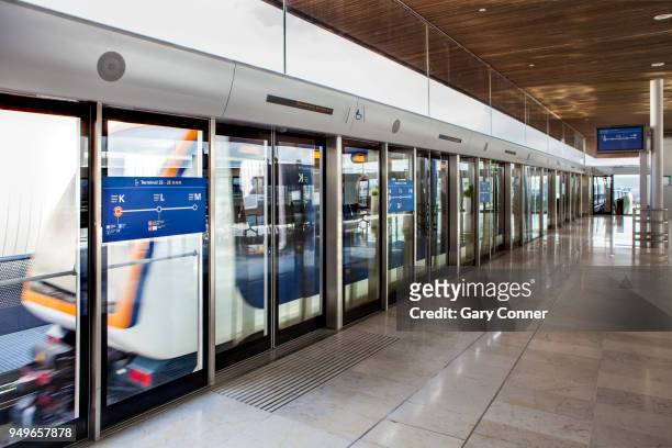tram to terminal at charles de gaulle airport - charles de gaulle airport stockfoto's en -beelden