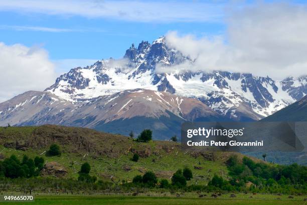 cerro castillo with clouds, carretera austral, near villa cerro castillo, xi., region de aisen, chile - carretera stock pictures, royalty-free photos & images