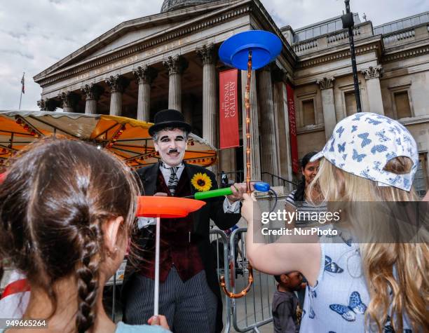 Londoners celebrate the annual Feast of St George, the patron of England, in Trafalgar Square, London, England, on April 21, 2018. Actors and...