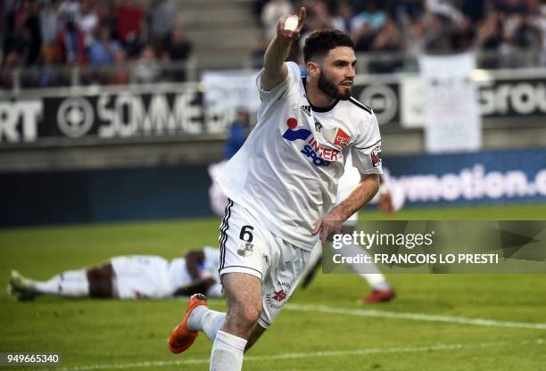 Amiens' French midfielder Thomas Monconduit celebrates after scoring a goal during the French L1 football match between Amiens and Strasbourg on...