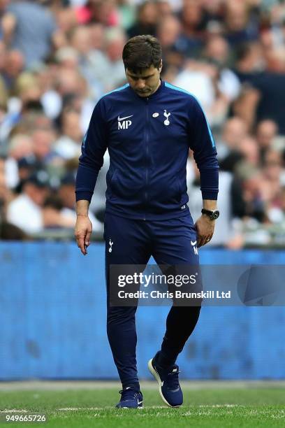 Manager of Tottenham Hotspur Mauricio Pochettino, looks down during The Emirates FA Cup Semi Final match between Manchester United and Tottenham...