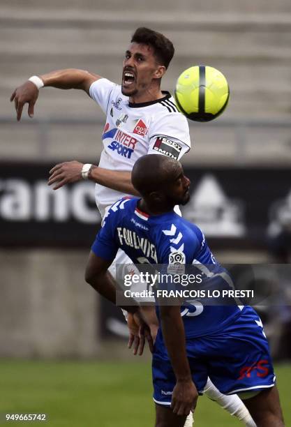 Amiens' Brazilian defender Danilo Fernando Avelar vies for the ball with Strasbourg's French defender Dimitri Foulquier during the French L1 football...