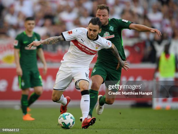 Anastasios Donis of Stuttgart is challenged by Philipp Bargfrede of Bremen during the Bundesliga match between VfB Stuttgart and SV Werder Bremen at...