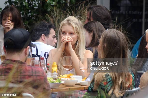 Lottie Moss and friends at Bluebird Cafe in Chelsea on April 21, 2018 in London, England.