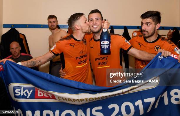 Players of Wolverhampton Wanderers celebrate winning the Championship during the Sky Bet Championship match between Bolton Wanderers and...