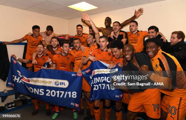 Players of Wolverhampton Wanderers celebrate winning the Championship during the Sky Bet Championship match between Bolton Wanderers and...