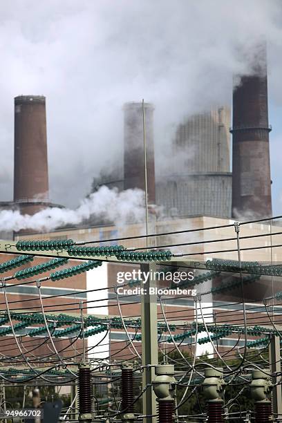 Electricity cables hang in a transformer chamber at the RWE AG owned coal-fired power station in Niederaussem, Germany, on Tuesday, Aug. 11, 2009....