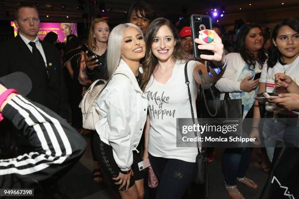 Isabel Bedoya poses with fans during Beautycon Festival NYC 2018 - Day 1 at Jacob Javits Center on April 21, 2018 in New York City.