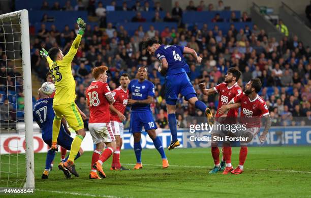 Sean Morrison of Cardiff heads the opening goal during the Sky Bet Championship match between Cardiff City and Nottingham Forest at Cardiff City...