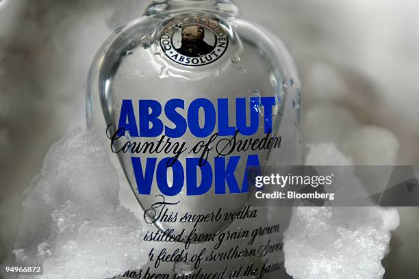 Bottle of Absolut Vodka, produced by Pernod Ricard, sits on ice in a bar in Paris, France, on Thursday, Sept. 3, 2009. Pernod Ricard SA, the world's...